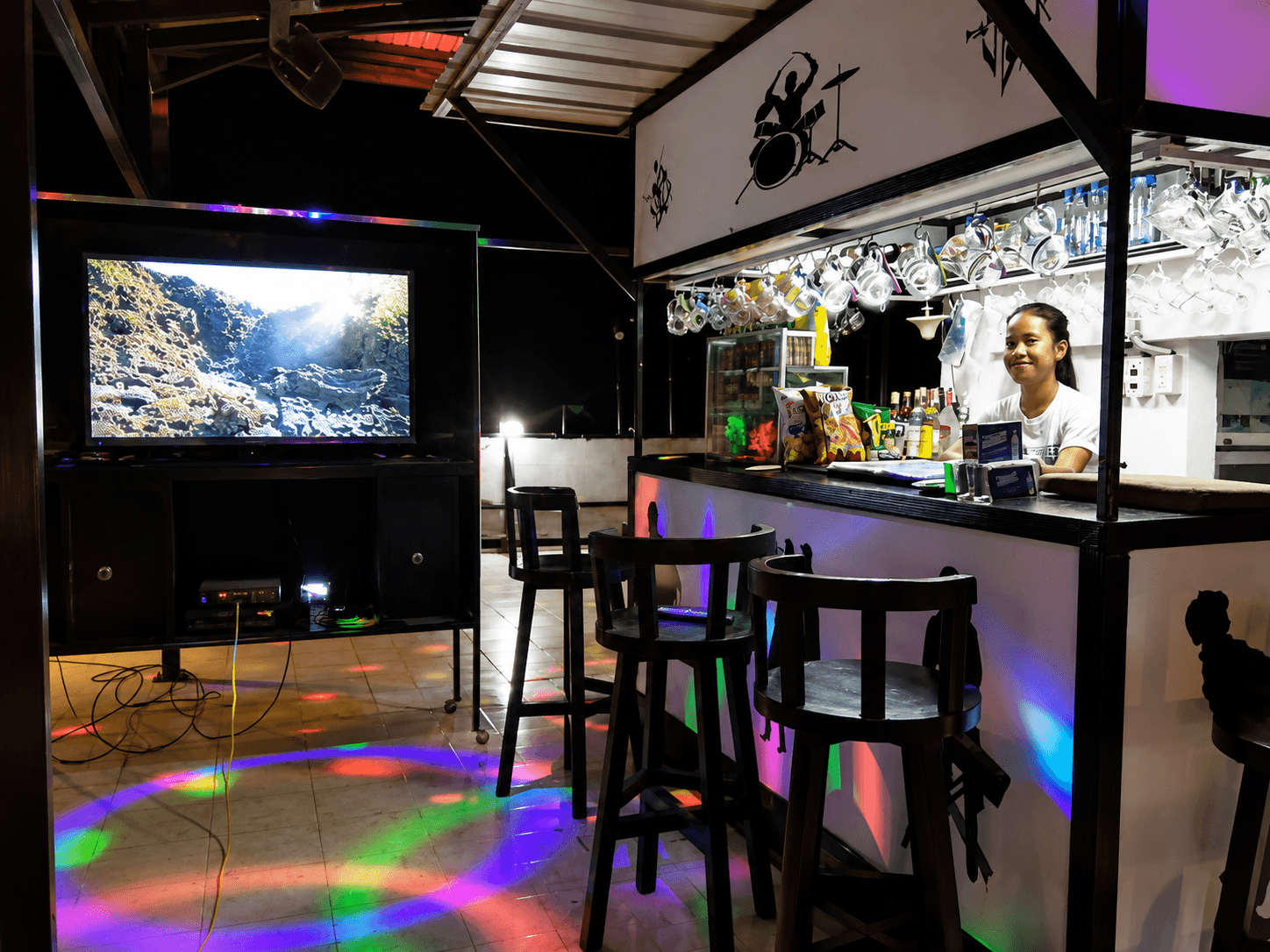 Western Highway Lodge — rooftop bar at golden hour